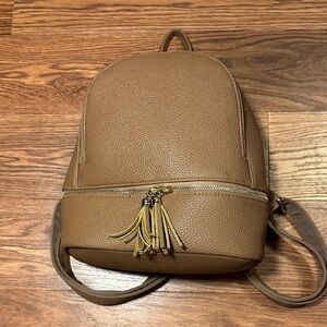 Chic Tan Backpack with Tassel Details